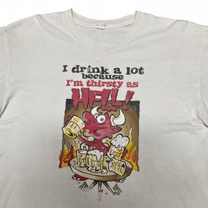Vintage I drink a lot because I’m thristy as HELL devil funny white T-shirt